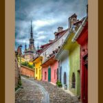 105-B06 Colourful Houses – Old Town Sighisoara brown mat